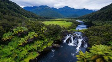 Serene Waterfall Cascading in Lush Green Valley Mountain River Scene photo