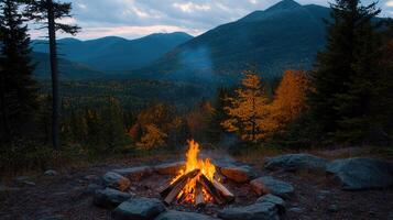 Majestic Mountain Campfire at Dusk Autumnal Forest Fire Pit Scene photo