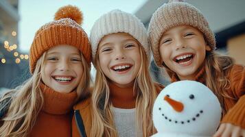 Three Happy Girls in Winter Hats Smiling with Snowman Festive Holiday Scene photo