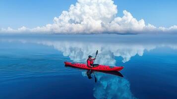 Serene Kayaking Adventure Person Paddling Red Kayak on Calm Ocean Under Dramatic Cloudscape photo
