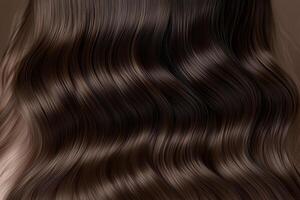 Close-up of luxurious soft wavy dark brown hair texture photo
