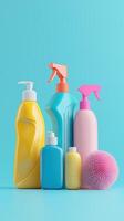 Colorful cleaning products arranged against a bright blue backdrop photo