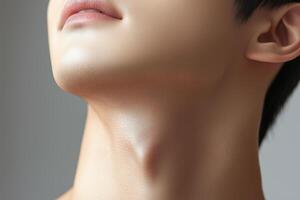 Close-up of male neck with smooth skin and defined jawline photo