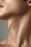 Close-up of a human neck skin texture and jawline photo