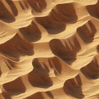 Abstract patterns in golden sand dunes with shadows and textures photo