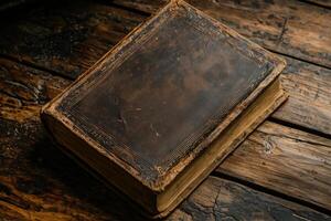 Vintage leather-bound book on rustic wooden table with rich textures photo