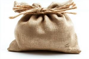 Brown burlap sack tied with rope on a white background photo