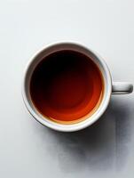 Close up of a kopi tubruk in a coffee cup on a table photo