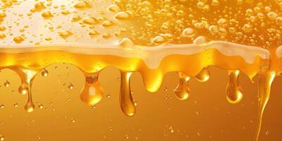 Golden honey dripping with a glossy sheen, showcasing its rich texture and natural sweetness. photo