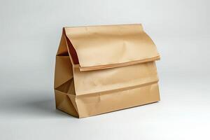A simple brown paper lunch bag, folded and structured, evoking nostalgia and practicality. photo