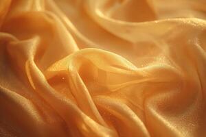 A close-up of flowing golden fabric, embodying luxury and elegance with its shimmering texture. photo