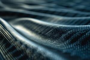 Close-up of textured fabric in deep blue tones, showcasing fine details and a smooth wave pattern. photo