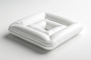 Stylish white square cushion, offering modern comfort and a minimalist aesthetic. photo