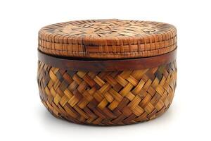 A beautifully woven round bamboo basket featuring a unique lid and intricate patterns. photo