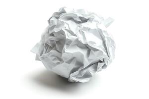 Crumpled white paper ball on a clean surface, representing discarded ideas and creativity. photo