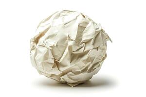 Crumbled white paper ball on a clean surface, symbolizing discarded ideas or creative processes. photo