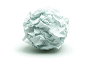 Crumpled paper ball on a plain background, symbolizing creative ideas and the writing process. photo