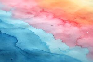 A vibrant abstract watercolor painting featuring a gradient of blues, pinks, and oranges, creating a serene and artistic effect. photo