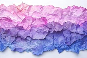 Textured abstract paper in pink and blue gradient shades, creating an artistic backdrop. photo