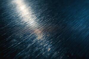Close-up of brushed metal surface reflecting light, creating an elegant and modern ambiance. photo