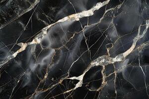 Elegant black marble with striking gold and white veining, showcasing a luxurious and sophisticated look. photo