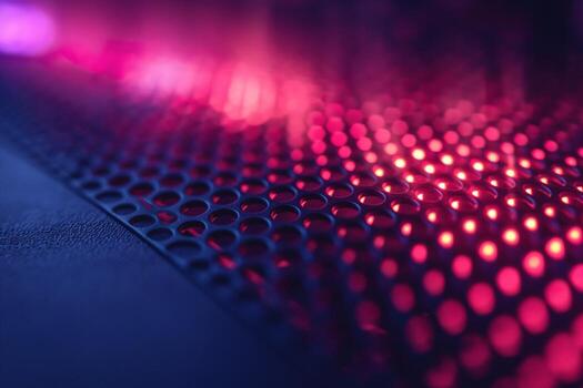 Close-up of a textured surface with vibrant purple and pink lighting effects, creating a futuristic and dynamic atmosphere. photo