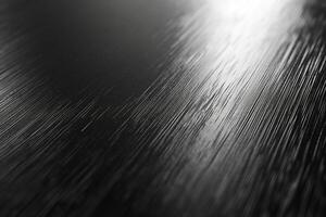 Close-up of a sleek, brushed metal surface showcasing an elegant texture. photo