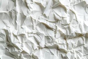 Close-up of crumpled white paper showcasing intricate textures and shadows. photo