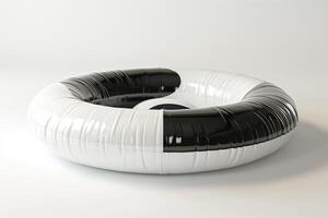 A stylish black and white inflatable pool ring, perfect for summer fun and relaxation. photo