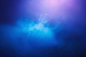A mesmerizing blend of blue and purple smoke swirling in an ethereal dance, creating an otherworldly atmosphere. photo