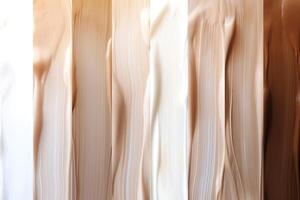 A spectrum of creamy foundation shades, showcasing diverse skin tones and textures in an artistic arrangement. photo