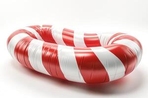 A vibrant red and white inflatable pool ring, perfect for summer fun and relaxation. photo