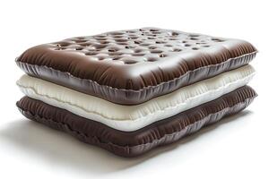 An artistic arrangement of three layers of inflatable mattress, featuring dark brown, white, and light brown colors. photo
