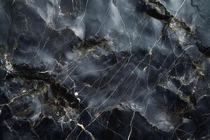 A stunning close-up of dark marble with intricate golden veins, showcasing rich colors and textures. photo