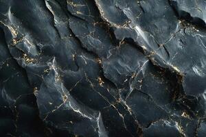 Luxurious black marble texture with gold veining, perfect for elegant backgrounds or design projects. photo