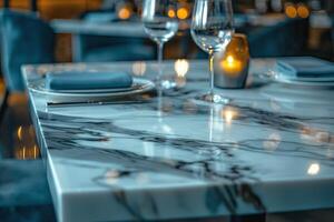 Elegant dining table set with fine glassware and soft candlelight ambiance, perfect for a special occasion. photo