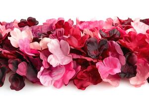 A vibrant collection of artificial flowers in various shades of pink and red, creating a lush and romantic atmosphere. photo