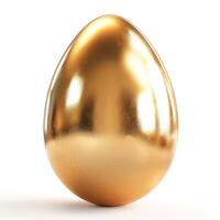 A shiny, reflective golden egg resting on a white background, embodying luxury and elegance. photo