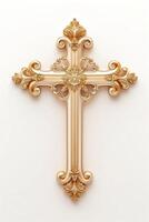 An ornate golden cross with intricate designs showcased on a plain background. photo