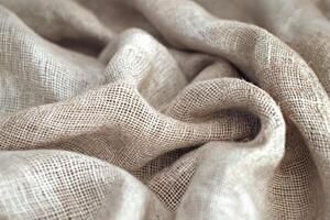 Close-up of textured beige linen fabric that creates a soft and inviting atmosphere. photo