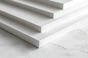Minimalist white stacked panels creating a modern aesthetic. photo