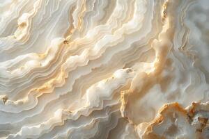 Close-up view of a stunning layered onyx stone, showcasing its smooth surfaces and intricate patterns in pale hues. photo