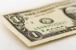 Close-up of a one dollar bill, showcasing intricate details and textures of the currency. photo