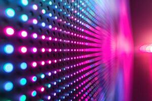 Vibrant abstract pattern of colorful LED lights in pink and blue hues creating a dynamic mood. photo