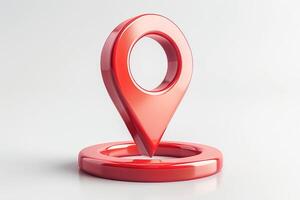 A glossy red location pin stands prominently on a smooth gray background, symbolizing navigation and direction. photo