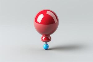 A vibrant red pushpin balanced atop a small blue one, showcasing a playful design against a minimalistic light background. photo