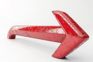 A bold, glossy red arrow pointing left, symbolizing direction and movement. photo
