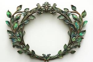 An elegant, intricately designed round frame adorned with green and gold leaves, perfect for showcasing artwork. photo