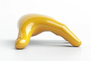 A sleek, abstract yellow hand sculpture resting on a white surface, showcasing a unique design and glossy finish. photo