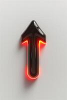A sleek black arrow sign glowing with red neon light, symbolizing direction and progress. photo